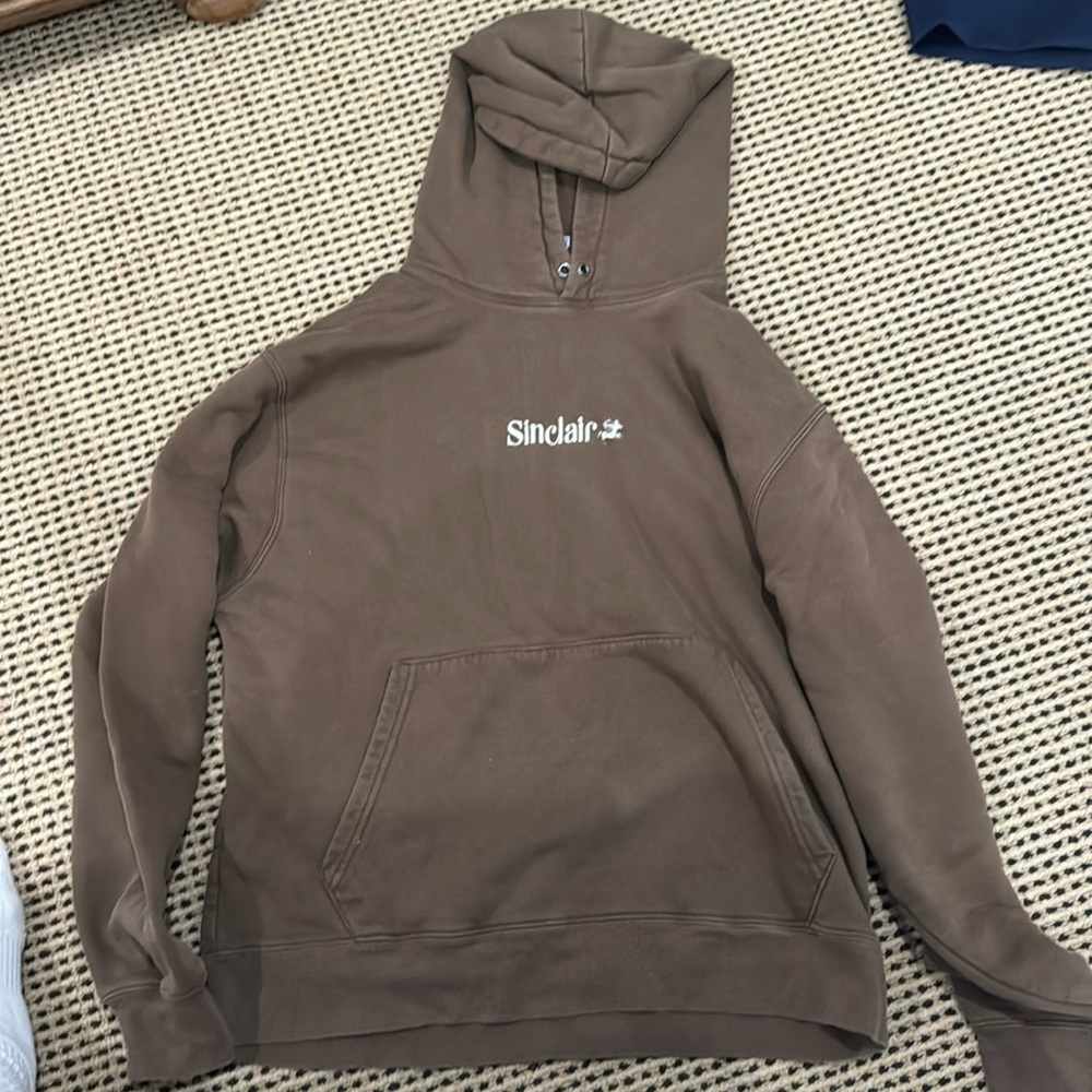 Large brown Sinclair hoodie.
